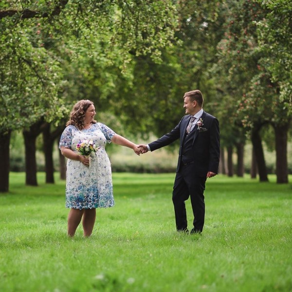 wedding-in-trees-holding-hands